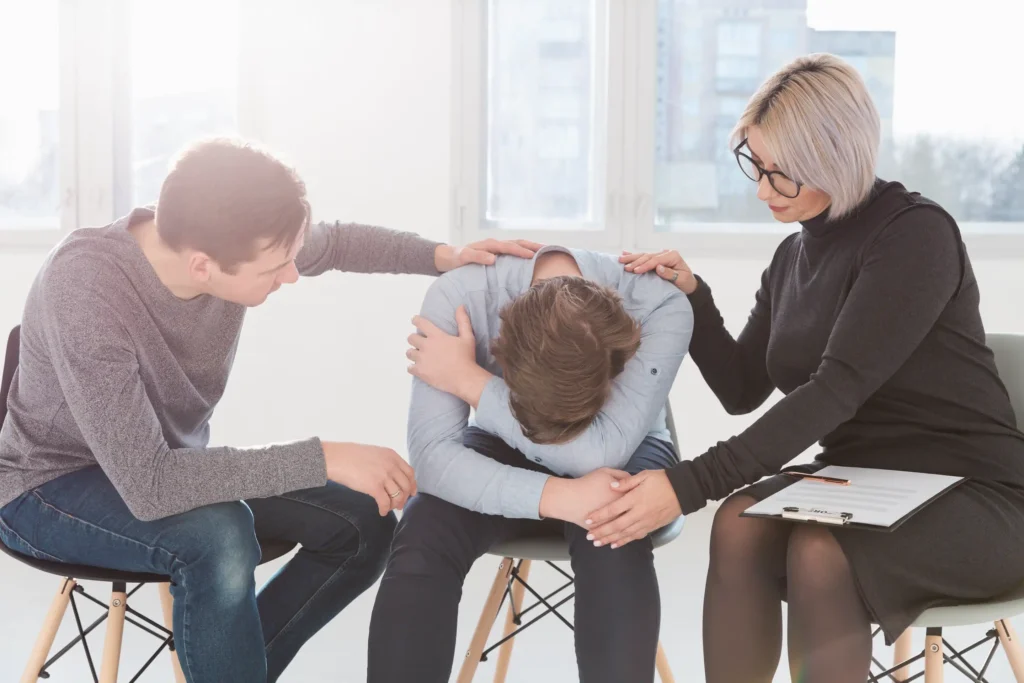 Person receiving support in counseling session